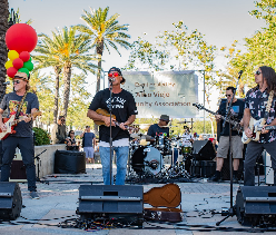 Five individuals perform at Aliso Viejo summer concert.